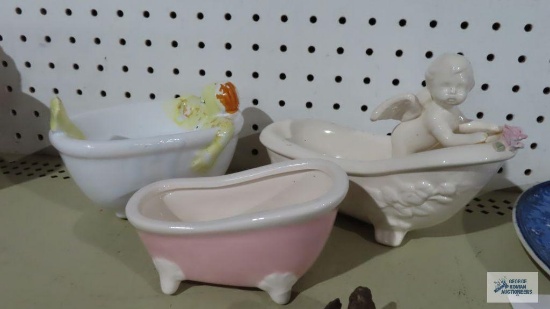 Three ceramic bathtub soap holders