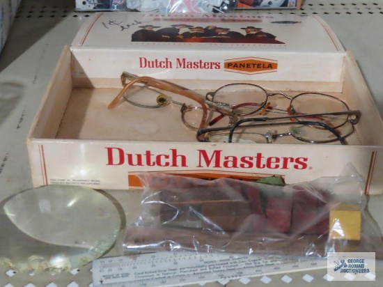 Vintage glass magnifier, eyeglasses, rulers, cigar box and etc