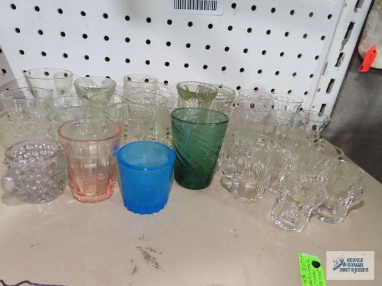Lot of shot glasses and other glasses