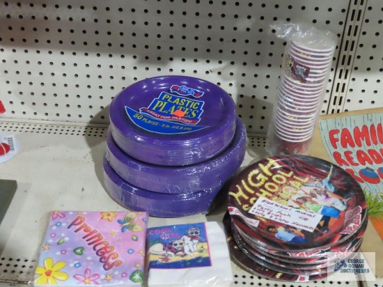 Lot of plastic plates and High School Musical plates, cups and various napkins