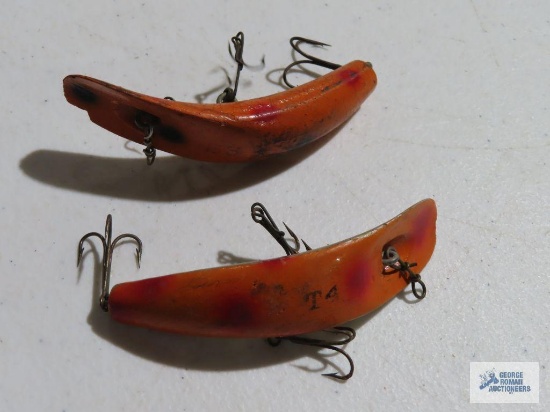 Two Helin wooden flatfish lures number T4 and S3. One has a chip