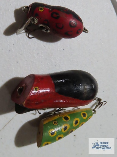 Three vintage wooden fishing lures