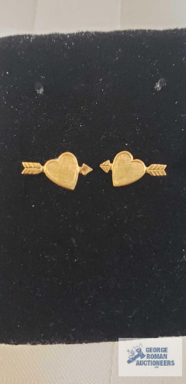 Gold colored heart with arrow shaped earrings, marked 14K