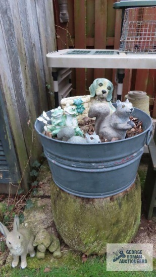 Metal wash tub with yard figurines. Must take contents
