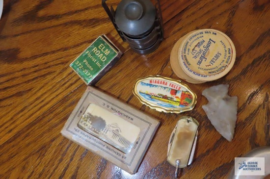 Arrowhead, pocket knife and assorted advertising items