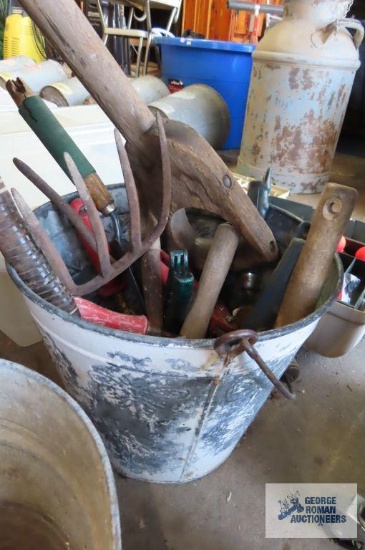 Galvanized bucket with assorted hand tools