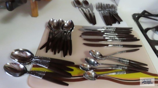 Phoenix cutting board and Northland stainless flatware