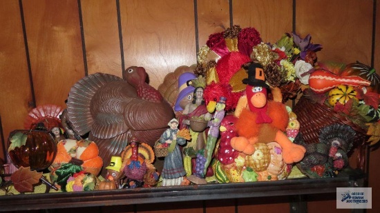 lot of Thanksgiving decorations and figurines