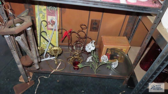 lot of decorations, candle holders and wind chimes