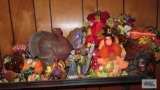 lot of Thanksgiving decorations and figurines