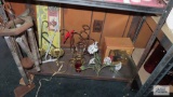 lot of decorations, candle holders and wind chimes