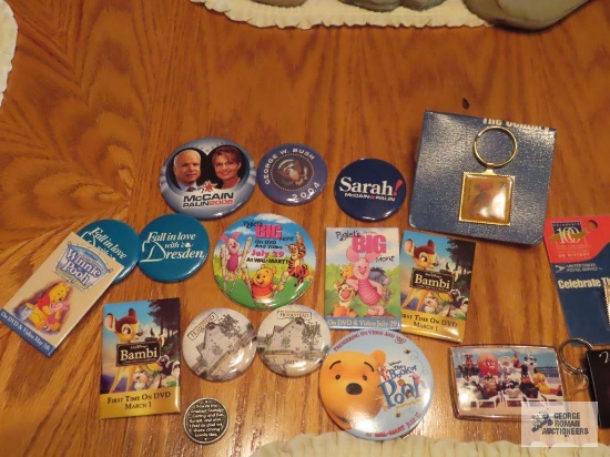 Assorted buttons and key chains