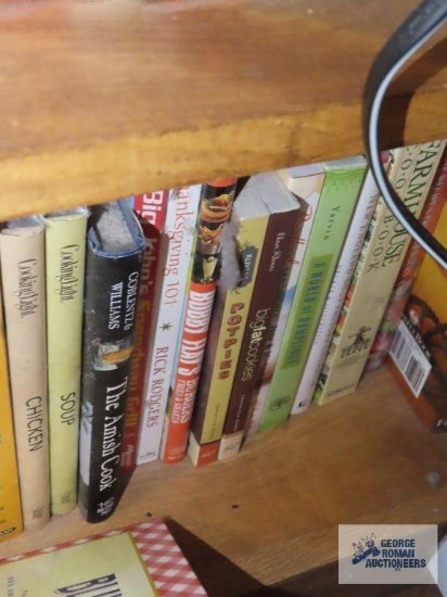 Books on bottom...shelf of bookcase