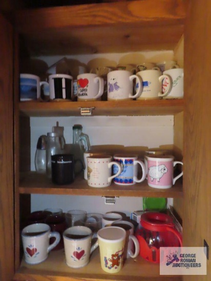 Large assortment of coffee mugs and etc
