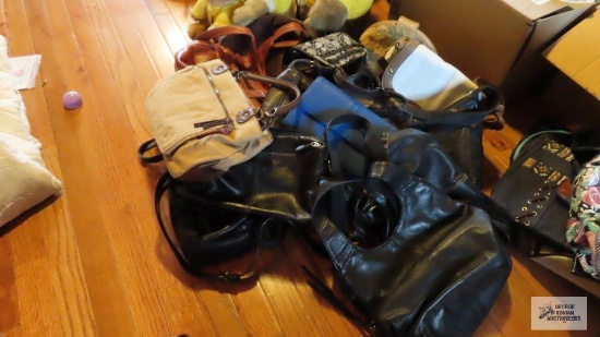 Large assortment of ladies purses