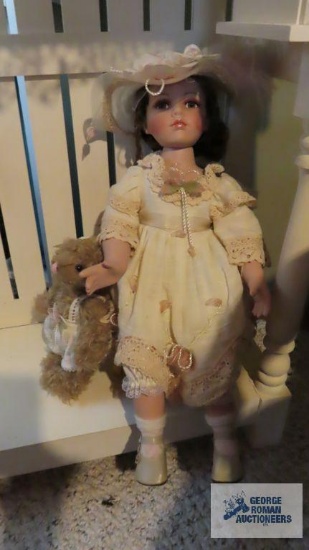 Vintage doll with bear