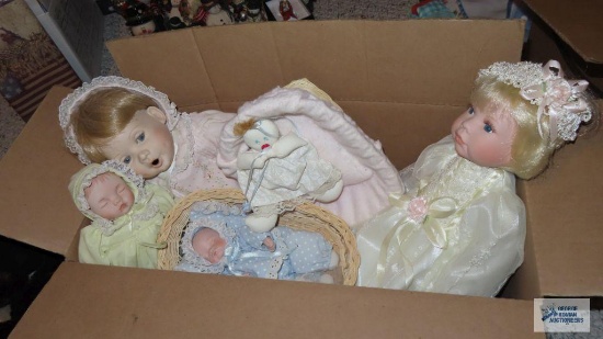 Assorted baby dolls with markings on neck