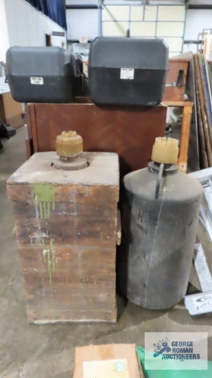 Two vintage chemical bottles. One of them has the original crate