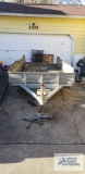 Galvanized shopmade utility trailer with dual 3500 lb axles, measures 14 ft by 5 ft 11 in. It takes