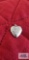 Silver colored heart-shaped locket, marked STER, approximately 2.82 G