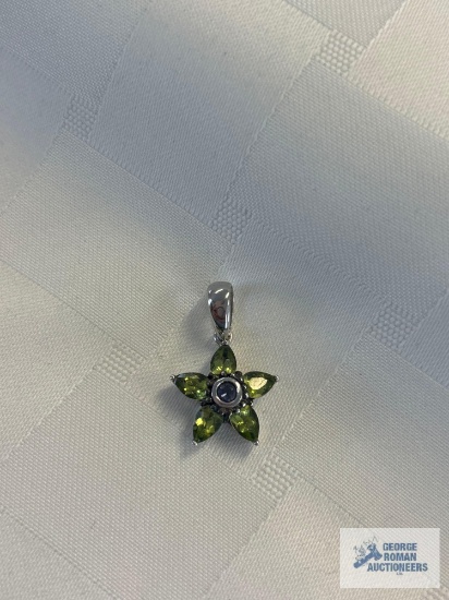Silver colored green and purple gemstone star pendant, marked 925, approximate total weight is 2.98