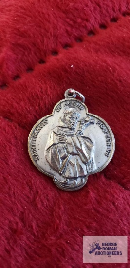 St Francis pendant, marked Creed Sterling, approximate total weight is 6.45 G