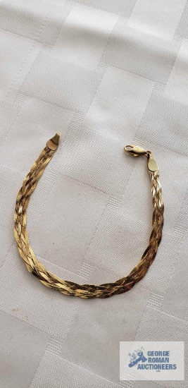 Gold colored braided herringbone bracelet, marked 14K Italy, approximate total weight 2.87 G