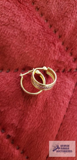 Two tone hoop earrings, marked 14K Israel, approximate total weight is 1.19 G
