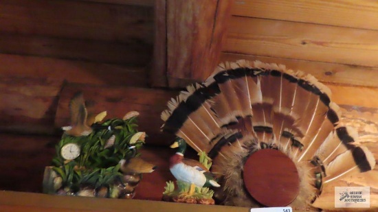 Feather decoration. Duck. Foliage clock.