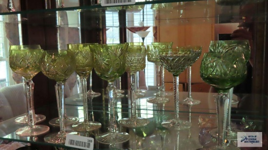 Shelf lot of decorative pale green stemware with cut glass appearance