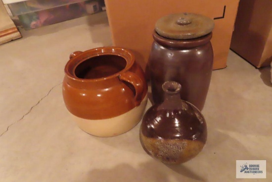 Brown and white bean pot, no lid. Brown crock with lid. Pottery jug.