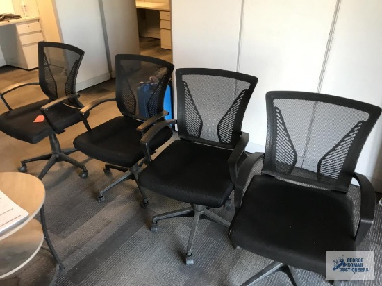 (4) BLACK SWIVEL CHAIRS