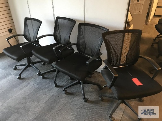 (4) BLACK SWIVEL CHAIRS