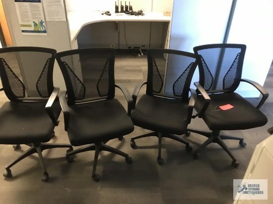 (4) BLACK SWIVEL CHAIRS