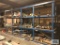 RACK AND CONTENTS ONLY. CONTAINING ALUMINUM AND STEEL STOCK....... MATERIAL ON FLOOR AND ALONG WALL 