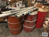 (3) BARRELS. 2 EMPTY AND 1 WITH FLUIDS