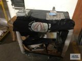 STEEL DISPLAY CART WITH LEVELERS AND SCRAP