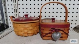 Two Longaberger baskets one cloth and plastic insert signed 2002 and other plastic insert signed