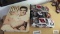 Two number 8 diecast cars, one number 3 die cast car, all featuring Elvis and Elvis Presley book.