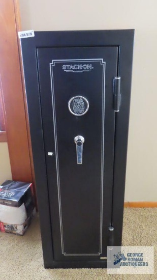 Stack on safe, key included, buyer will need to contact safe company to reset combination key