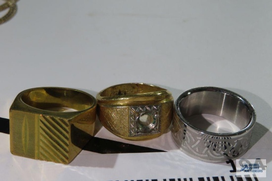Gold colored men's ring missing stone, marked 18K HGE and two other ...