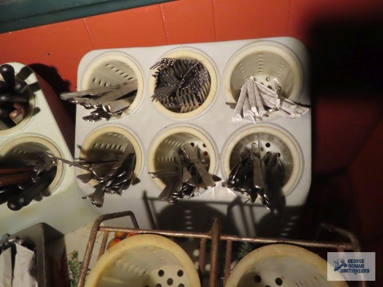 Variety of commercial flatware and flatware holders