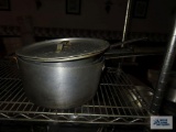 Large commercial saucepans with one lid