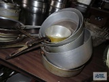 Variety of commercial saucepans