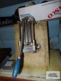 Vollrath french fry cutter mounted to cutting board