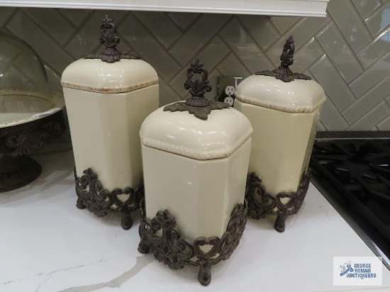 Gracious Goods three piece canister set with metal bases.