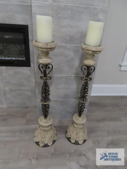 Pair of candlesticks with candles. Candlesticks are 28" tall.