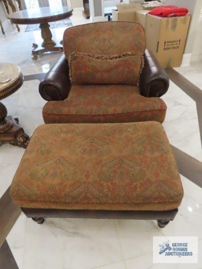Basista Furniture leather and cloth chair with ottoman. 43" wide.