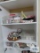 Sewing supplies, including ribbon, thread, and fabric pieces