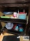 Cupboard of plastic ware and serving bowls